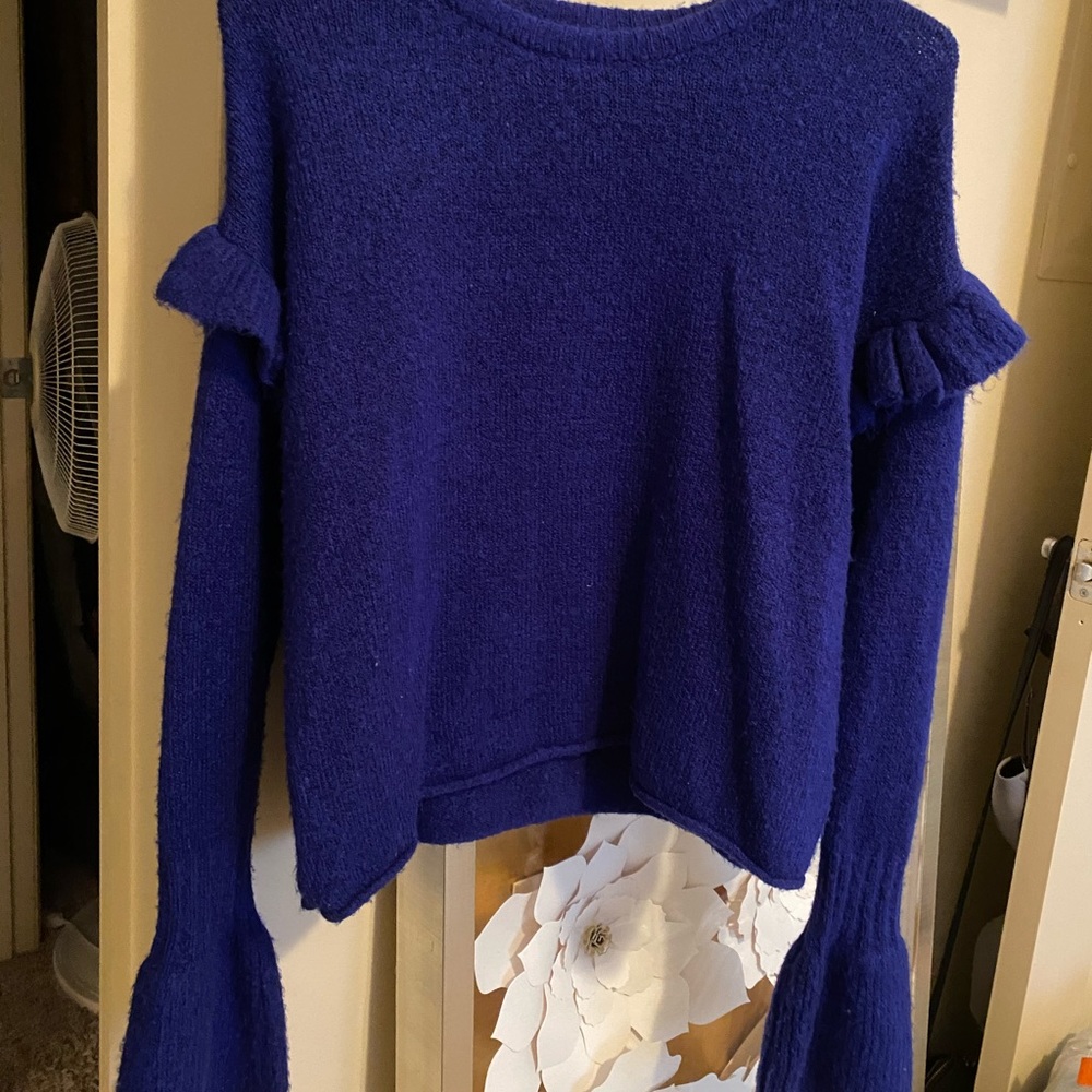 Long sleeved light weight bright blue sweater